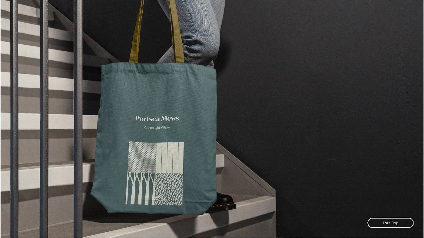 Tote bag mockup carrying the Portsea Mews branding.