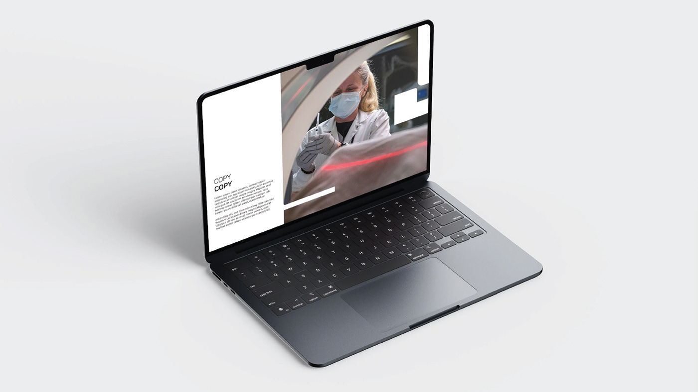 Website mockup on a laptop.